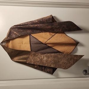 Chicos genuine  leather shawl wrap has bronze, leopard and lace prints